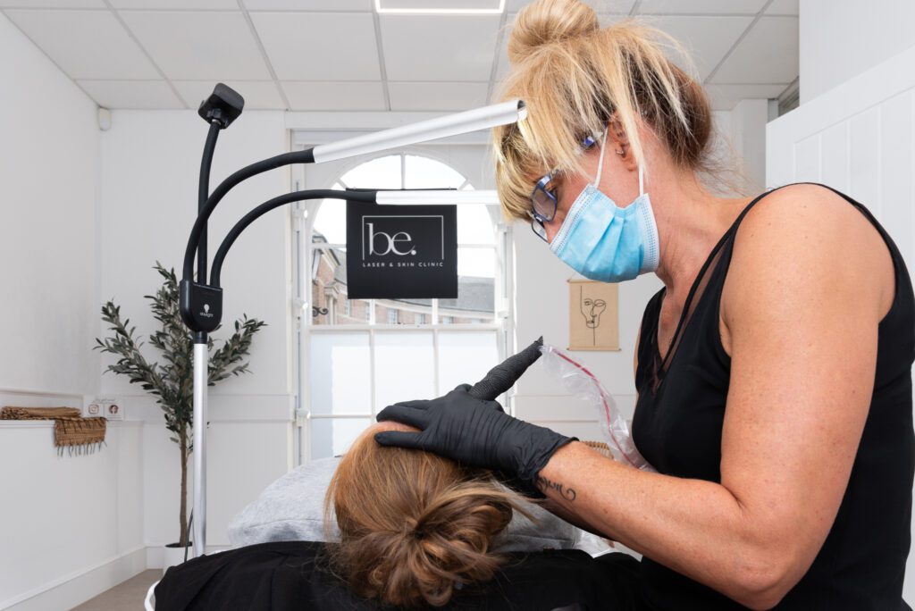 Claire applying tattoo eyebrow in be laser skin care clinic